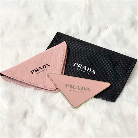 Prada beauty triangle pink hand mirror 